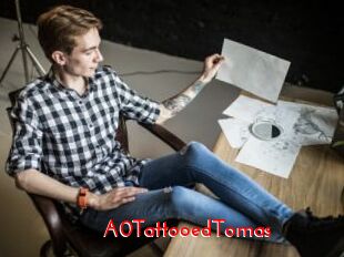 A0TattooedTomas