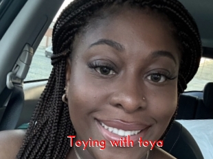 Toying_with_toya